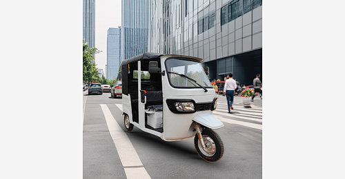 Electric passenger tricycle with enclosed cabin body